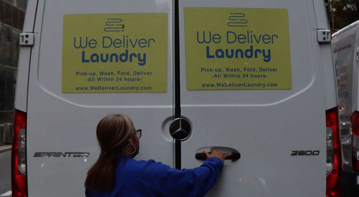 We Deliver Laundry van delivering clean laundry in a New Jersey neighborhood